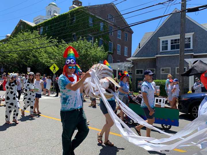 Grass Fellows march in the 2022 4th of July Parade in Woods Hole