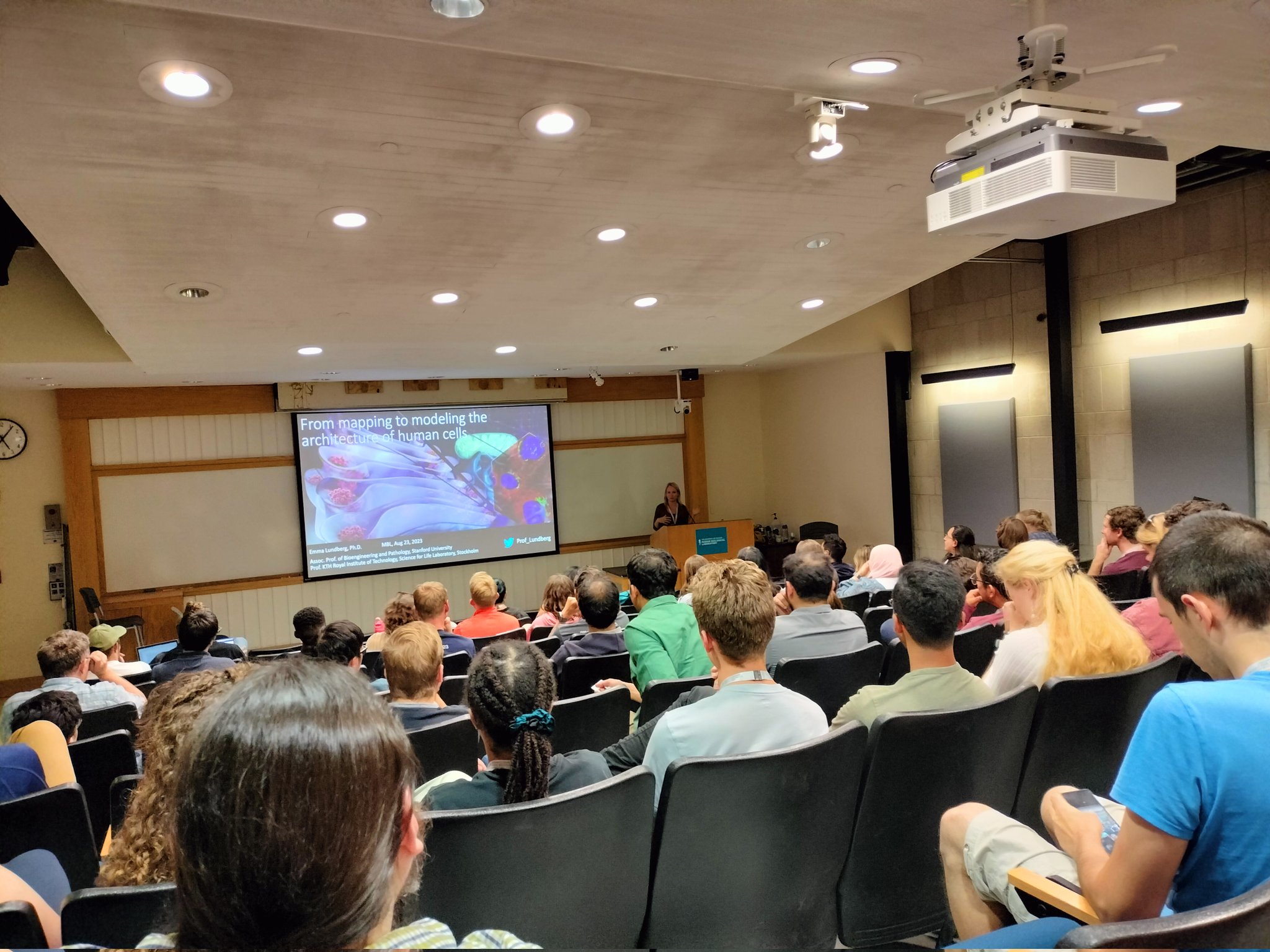Students from the Optical Microscopy (OMIBS) and Deep Learning 2023 Advanced Research Training Courses in a lecture in Speck Auditorium.