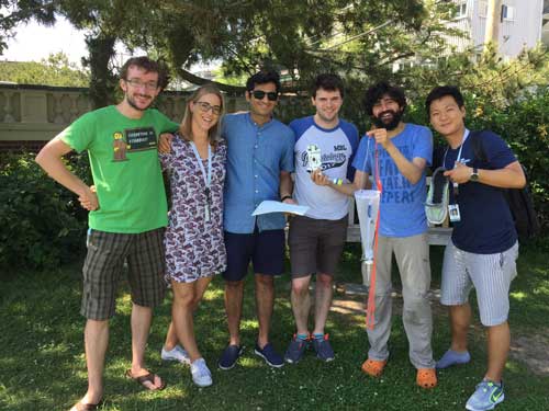 Manu Prakash, second from right, holds the Foldscope microscope and a plankton tow in Waterfront Park, Woods Hole, with MBL Physiology course students. All photos courtesy of Manu Prakash.