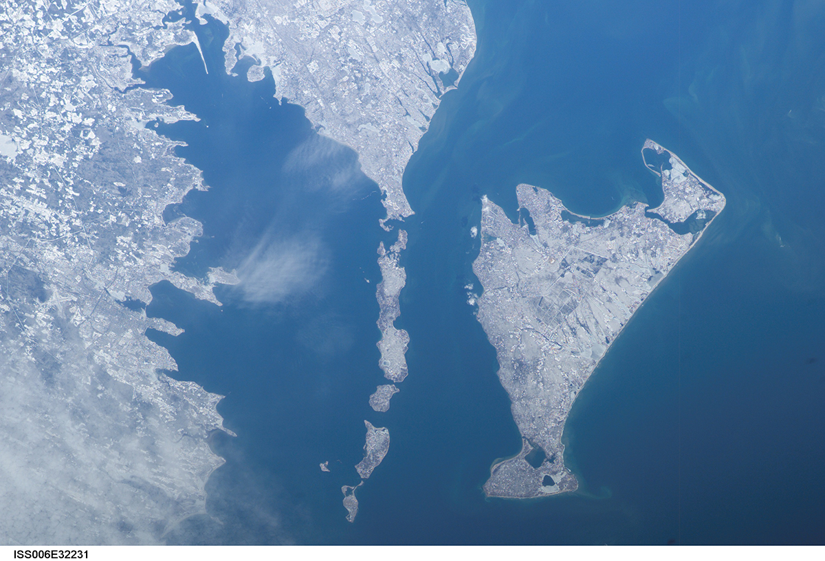Viewed from left: The southeastern Massachusetts coast; Buzzards Bay; The Elizabeth Islands, Woods Hole and Falmouth, Mashpee and Bourne; Vineyard Sound and Martha’s Vineyard, from the International Space Station in 2003. Image courtesy of the Earth Science and Remote Sensing Unit, NASA Johnson Space Center.