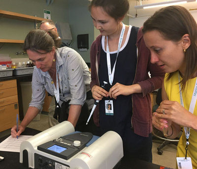 2018 Biomedical Fellows (from left) Macon Morehouse, Shayla Love, and Irene Rodríguez-Salas in their research lab. Credit: Tara Haelle