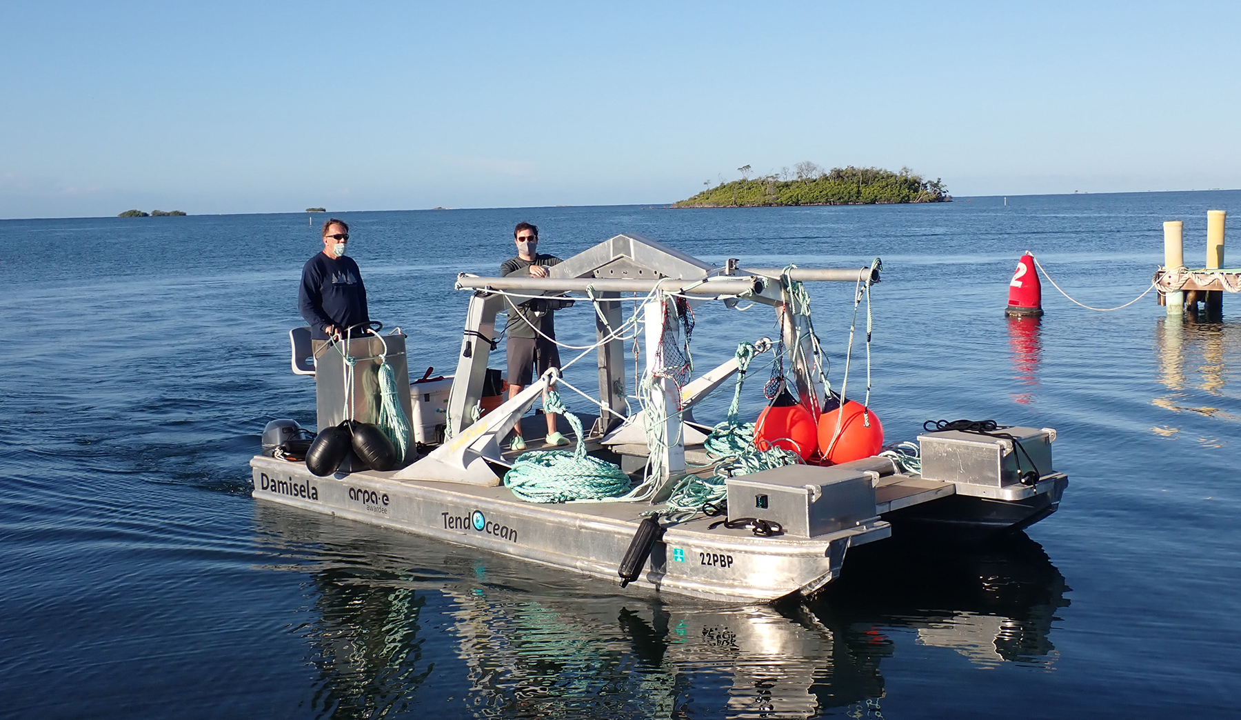 Cliff Goudey and Domenic Manganelli of C.A. Goudey & Associates/Tend Ocean, transporting the anchors, line, and buoys used for the seaweed farm off Puerto Rico. Credit: Loretta Roberson