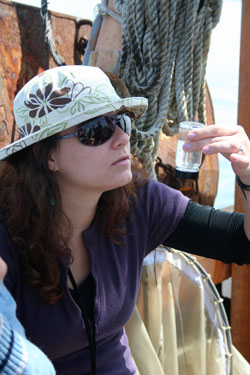 2009 Biomedical Fellow Juliana Tiroboschi  on the MBL's specimen collecting vessel, the R/V Gemma.