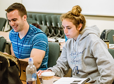 UChicago Biological Sciences Division students Matt Trendowski and Hallie Sussman work in the MBL’s Loeb Laboratory during the Quantitative Biology bootcamp in 2016. Credit: Megan Costello
