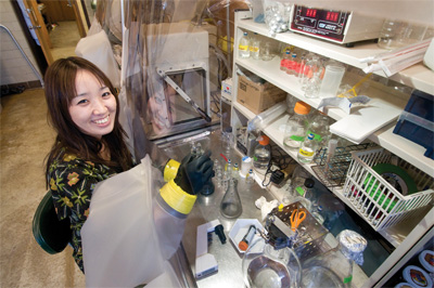 Yuko Hasegawa in the MBL's Bay Paul Center. Photo by Tom Kleindinst