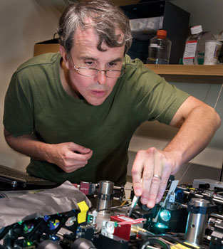 Eric Betzig tests one of his super-resolution microscopes, still under development, at the MBL. Credit: Tom Kleindinst