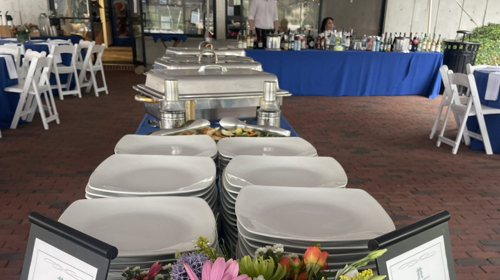 Buffet station with bar station in background.