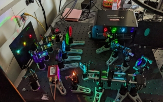 This home built laser sled is an illumination source for the line scanning fluorescence microscope. Four visible lasers (405, 488, 561 and 640 nm) are combined using mirrors and dichroics. Designed and built by Matthew Parent, MBL. Credit: Emily Greenhalgh