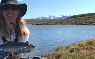 Heidi Golden holds Arctic Grayling