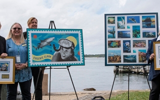 Woods Hole scientific leadership join USPS officials to commemorate ocean-themed stamps. 