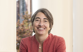 Head and shoulders professional image of Alexandra Z Worden, a scientist wearing a pink jacket