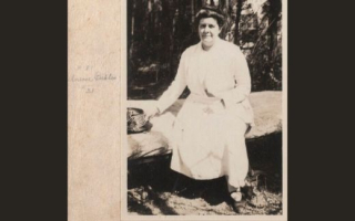 A vintage photo of a female scientist.