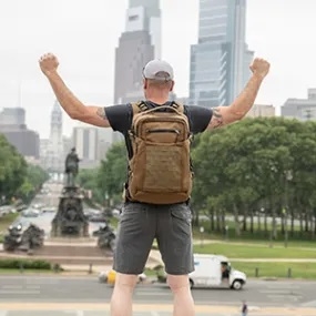 A Lightning Packs team member celebrates wearing the HoverGlide after running up the stairs of the Philadelphia Art Museum. Credit: Lightning Packs LLC