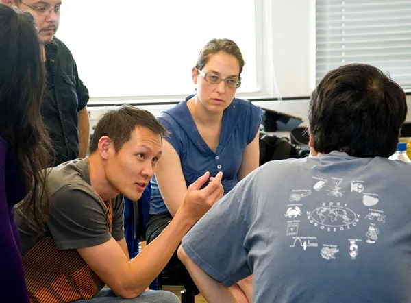 Batbileg Bor (L) Einat Schnur (R) discuss a team-based research project during the MBL Physiology course in 2013. Credit: Tom Kleindinst/MBL