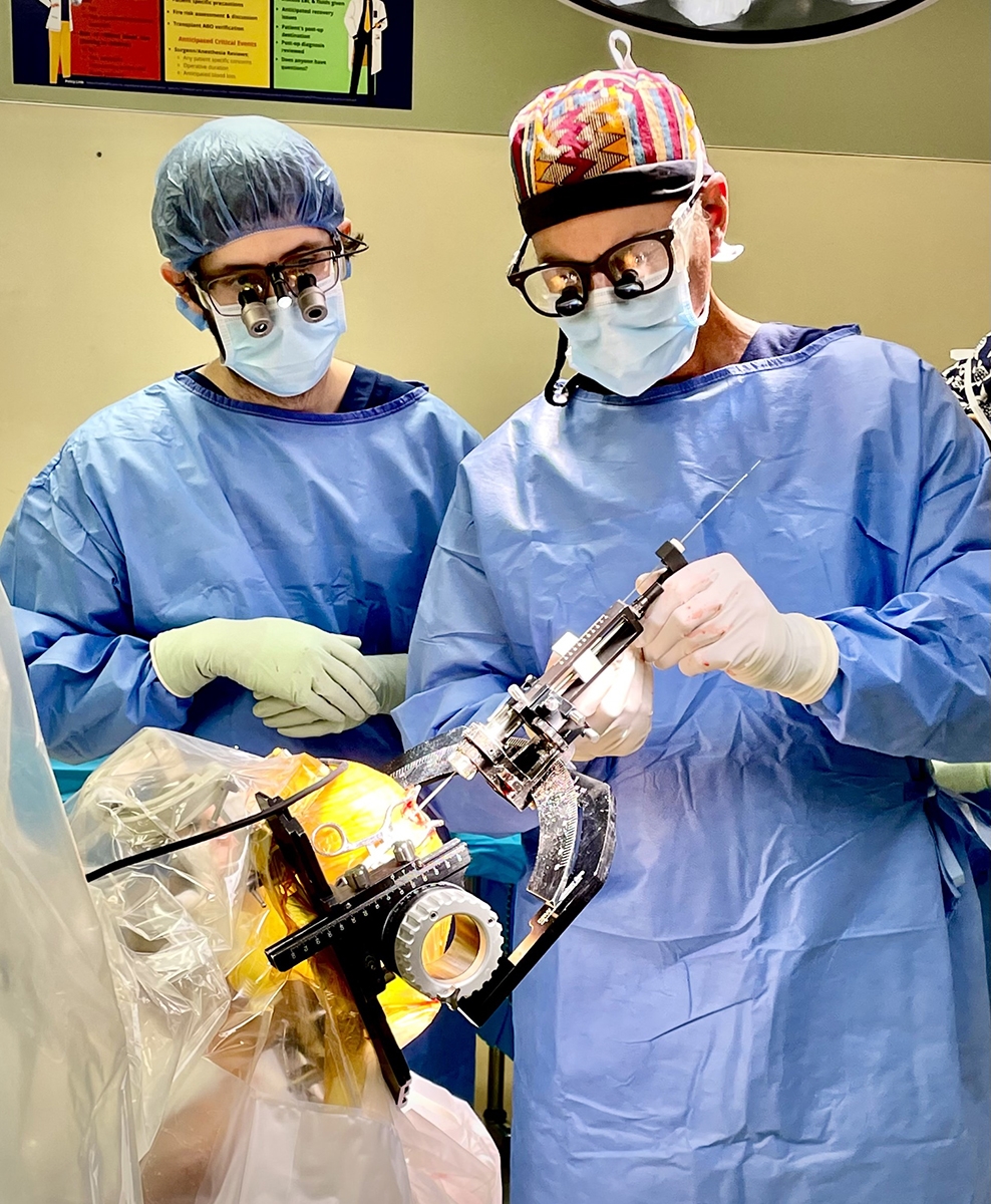 Craig van Horne, on right, performing deep brain stimulation on a patient with Parkinson's Disease in 2023. 