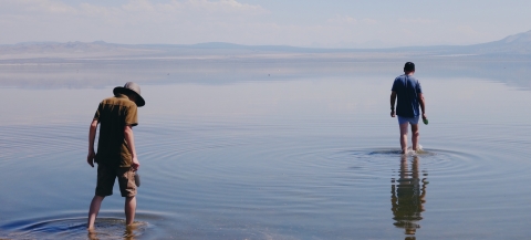 Researchers explore the waters of Mono Lake, looking for signs of life. Credit: Pei-Yin Shih