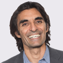 A scientist in a blue shirt