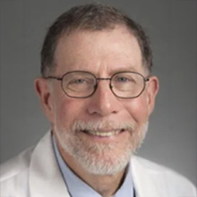 A scientist in a white coat