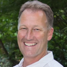 A man in a white shirt