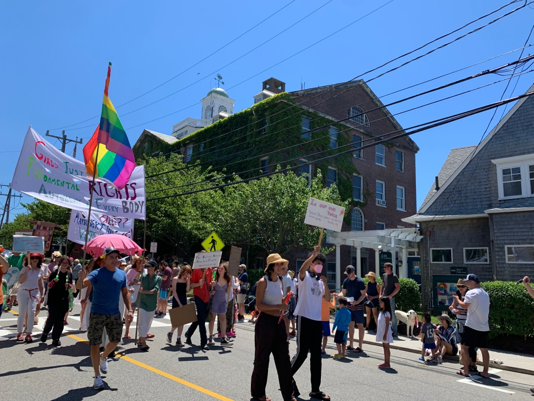 Participants march in the 2022 Woods Hole Fourth of July Parade